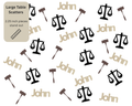 Law school confetti scattered on table for lawyer and JD graduation party decor