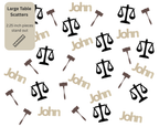 Law school confetti scattered on table for lawyer and JD graduation party decor