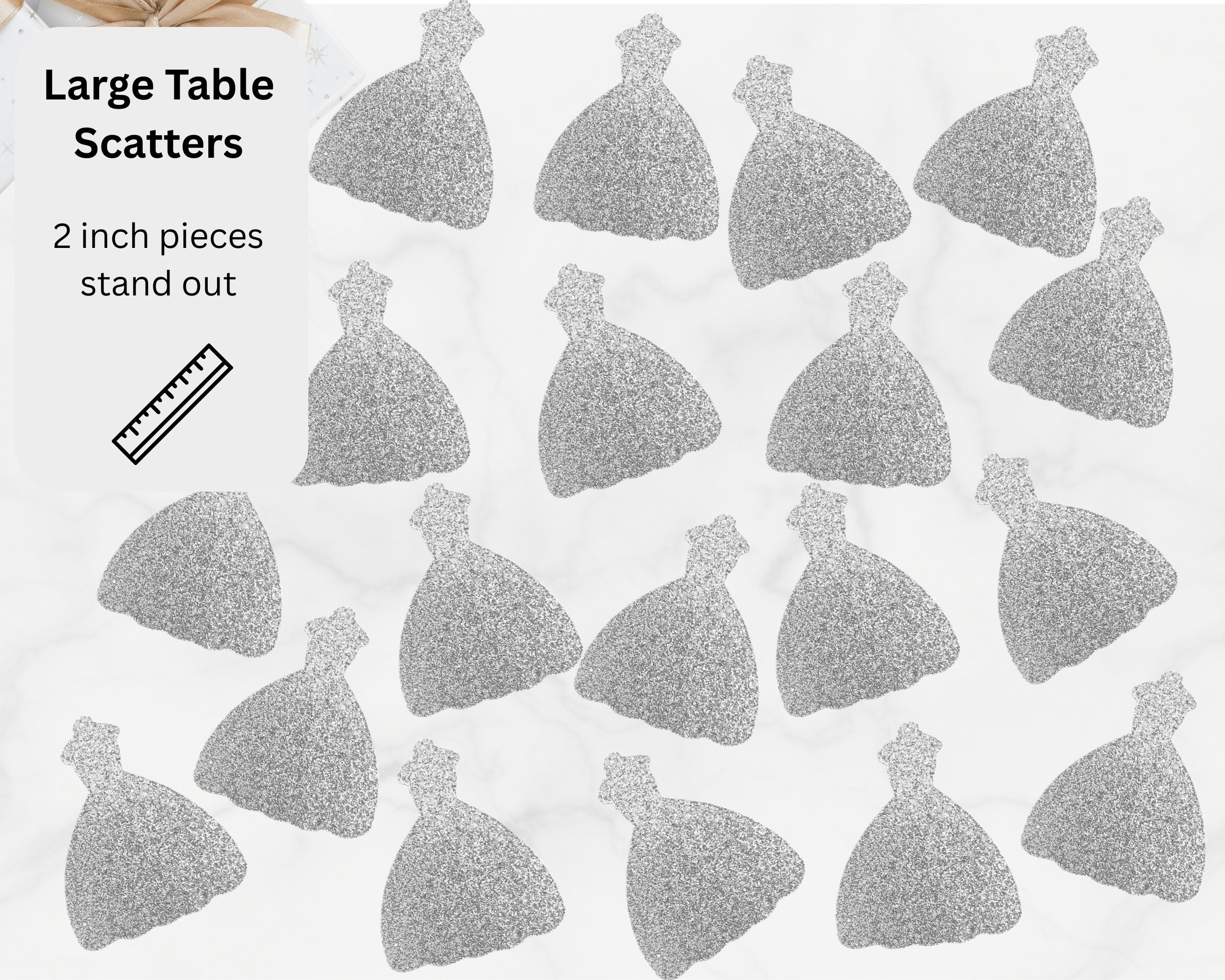 Wedding dress shaped confetti scattered on large table for bridal party decoration